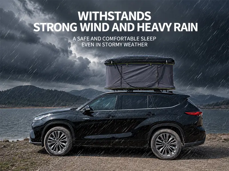 Hard shell rooftop tent on SUV withstanding strong wind and heavy rain