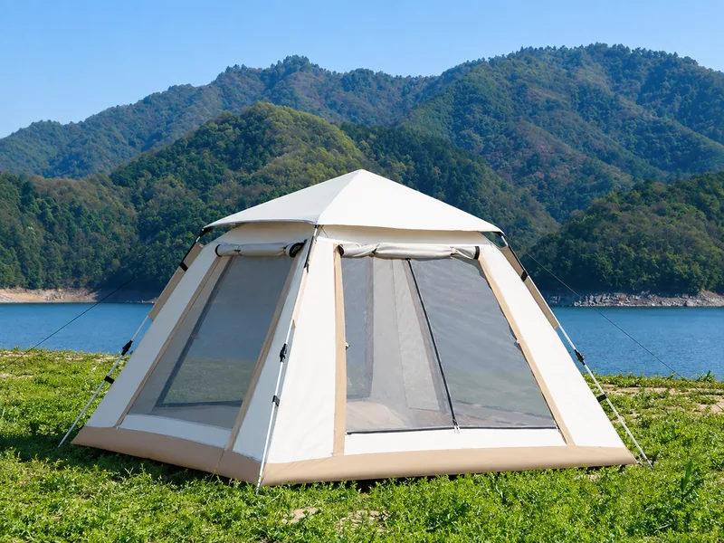 Beige Camping Tent with Mesh Windows by the Lake